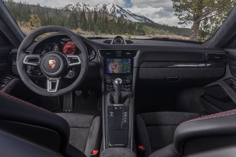 The GTS has a sport-steering wheel and interior alcantara trim