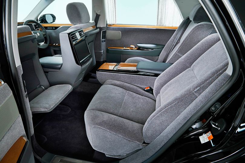 A pass through gives more legroom to rear passengers, and a new console screen offers fresh technology.. Toyota