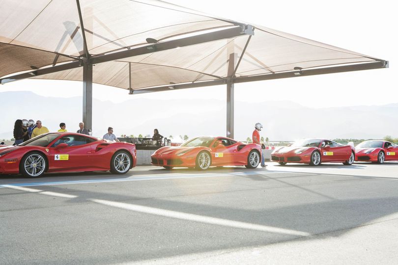 Ferrari's workshop participants lined up at the Corso Pilota private racetrack