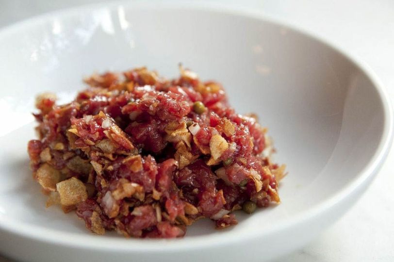 Simplicity reigns at Estela, like in this beef tartare studded with sunchokes