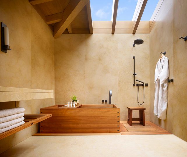 You’ll spend all your time alternating between the private deck overlooking the ocean and the Japanese-style tub.