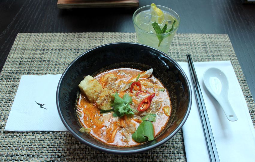 Chicken laksa with fried tofu, vermicelli and bok choy from the Spice Bar, Melbourne Domestic Business Lounge. Chris Chamberlin