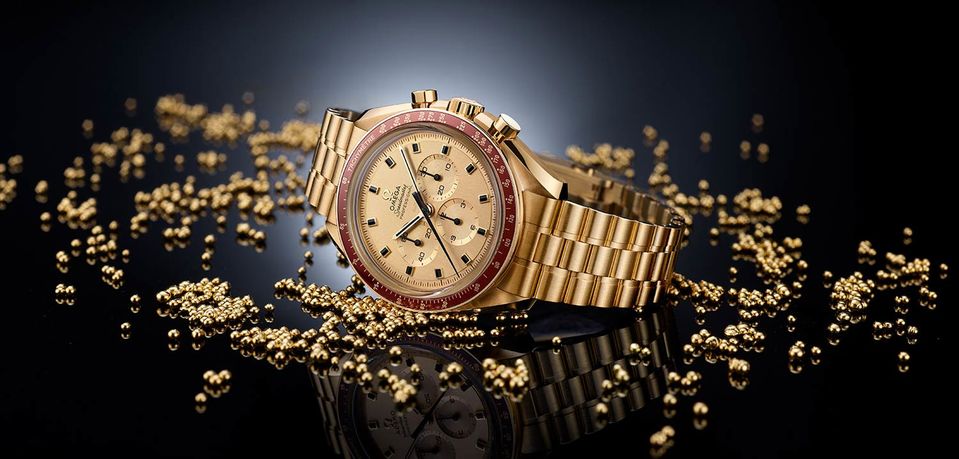 Omega's Apollo 11 50th anniversary Speedmaster edition dazzles in what the watchmaker dubs Moonshine 18K gold.