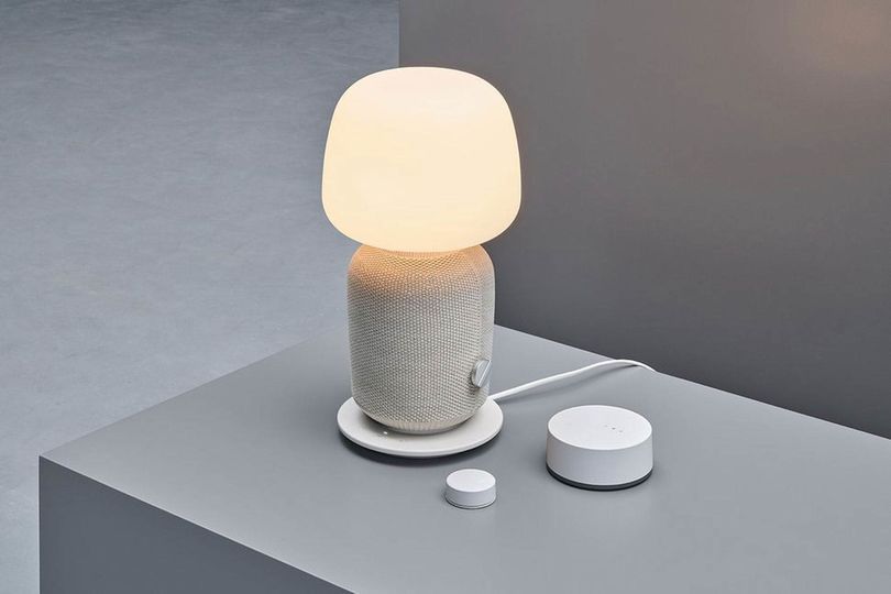Ikea's Symfonisk remote control, shown here with the larger Tr&aring;dfri smart home gateway