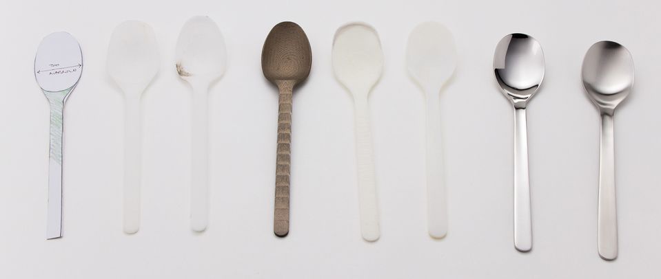 Evolution of a spoon: mockups from paper to wood to 3D printing and the finished product.