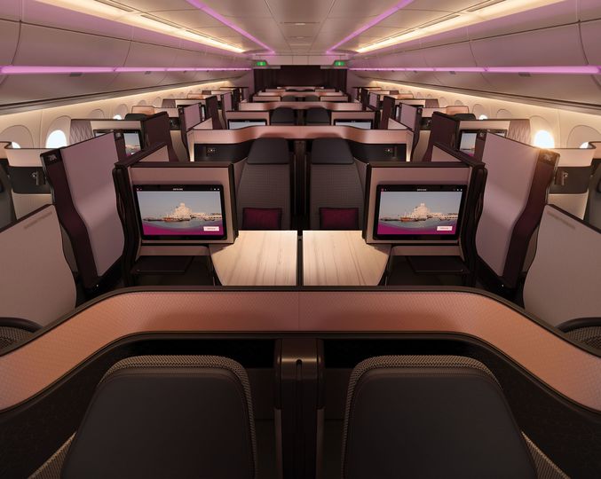 Golden hues and purple highlights give the Qsuites a regal glow.