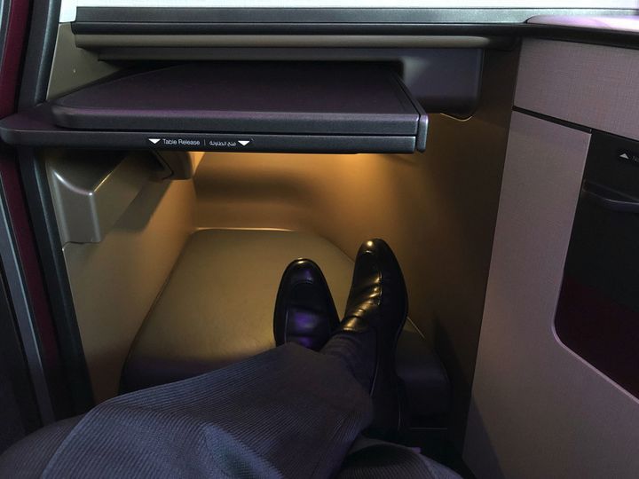 Even the foot cubby is much larger than other staggered business class seats.