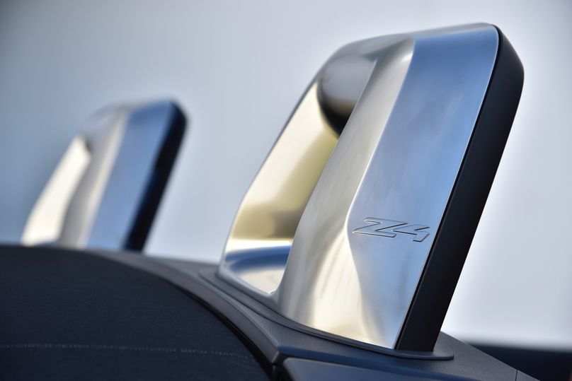 It'd be a sin to cover these stylishly-carved roll bars by putting the Z4's roof down.