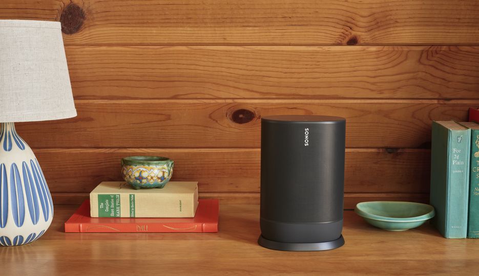The charging base keeps the Move's battery topped up.