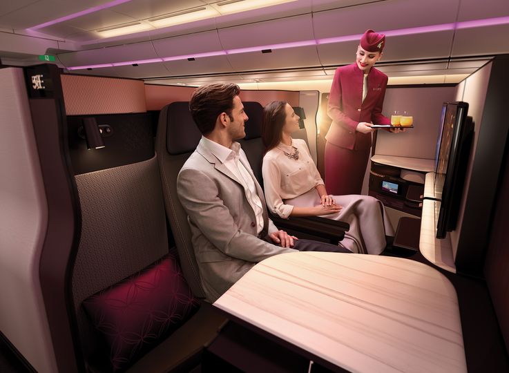 The Qsuite's middle seats combine to create a 'twin suite' for when you're flying with a partner.