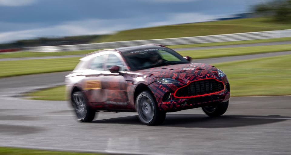 Clad in line-concealing camouflage, Aston Martin puts the DBX through its paces.