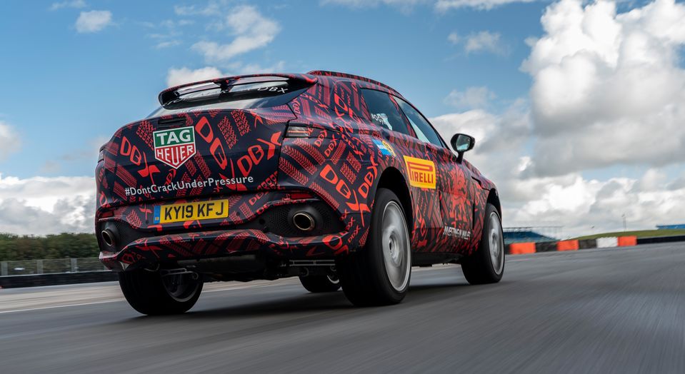 Clad in line-concealing camouflage, Aston Martin puts the DBX through its paces.