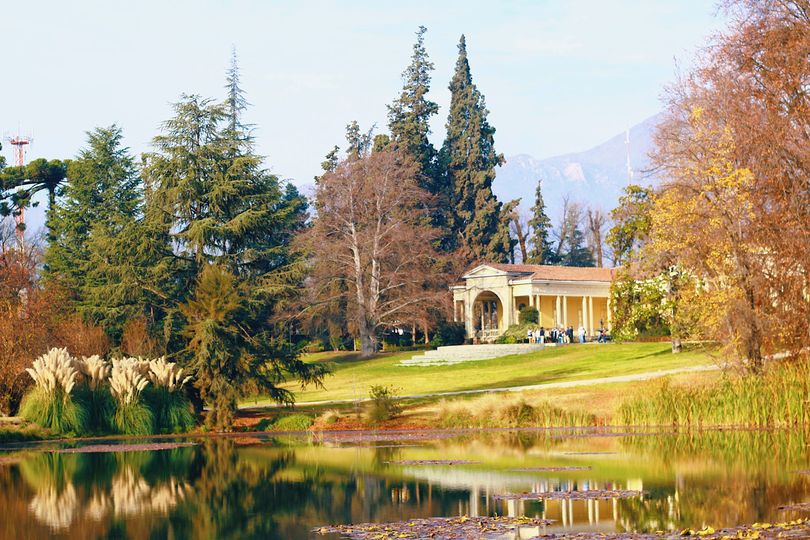 Beautiful landscape at Concha y Toro winery, a famous tourist spot in Chile’s capital, Santiago. The lake reflects the mansion and the surrounding trees.
