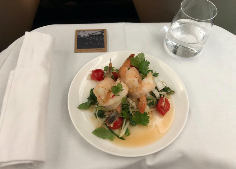 Poached prawns with chili and lime, designed to wake passengers up.