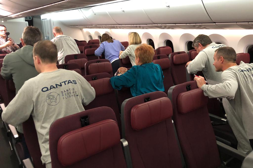 Passengers undertake synchronized exercises mid-flight.