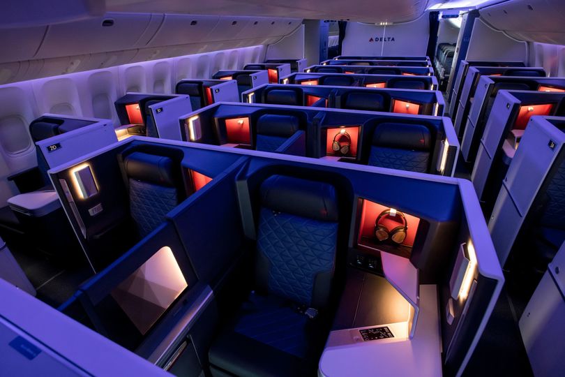 Settle into a private suite in Delta One from Sydney to LAX, upgraded using Velocity points.