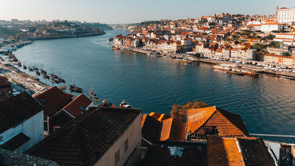 The Douro river snakes through the Porto old town.