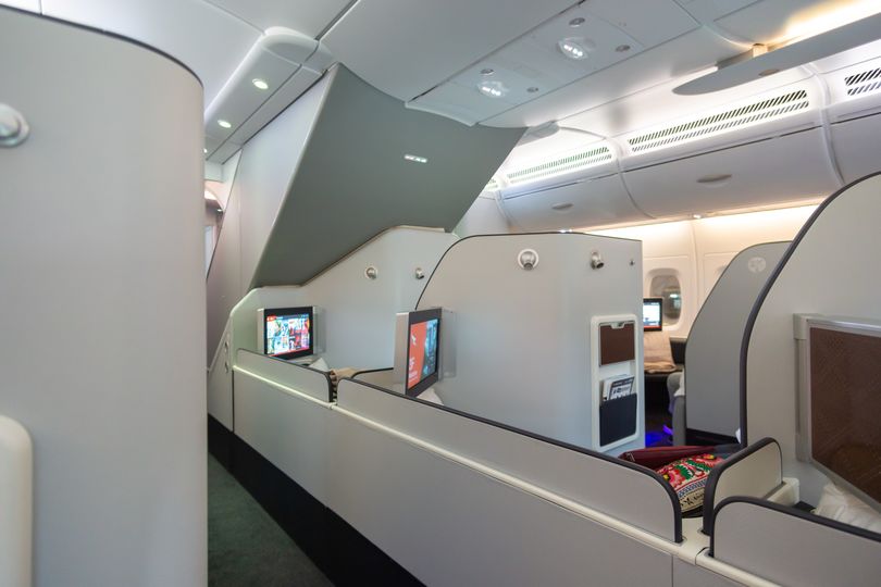 Privacy isn't an issue, even in these wide-open suites. Those shields automatically raise at cruising altitude.