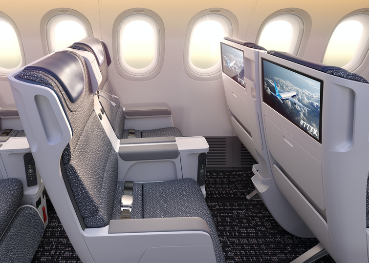 Large windows next to Boeing's 777X premium economy cabin mock-up.