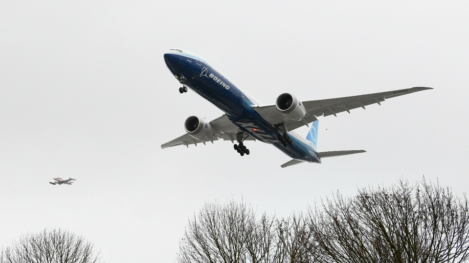 The 777X features sweeping composite wings.