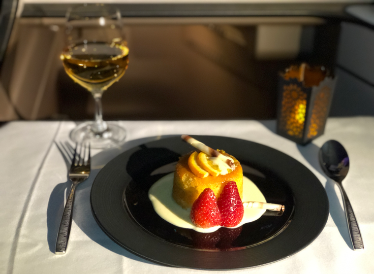 Warmed orange semolina pudding.
