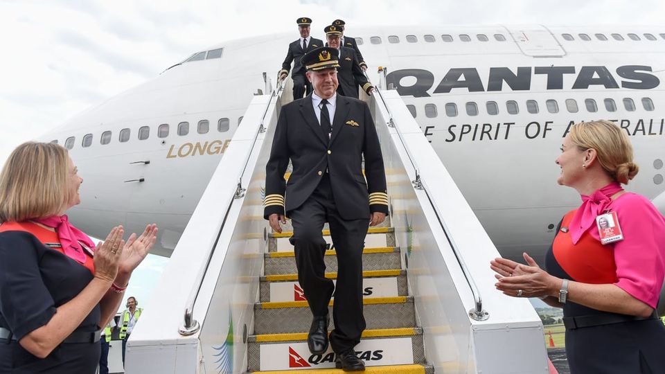 Welcoming the flight deck crew of VH-OJA on her arrival at HARS.