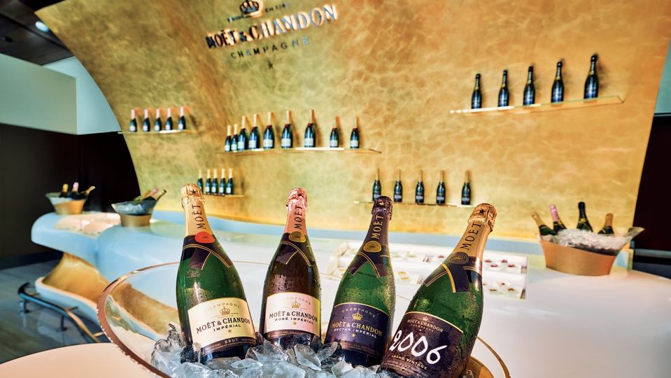 Emirates' flagship business class lounge includes a Champagne Bar stocked by Mo&euml;t & Chandon.