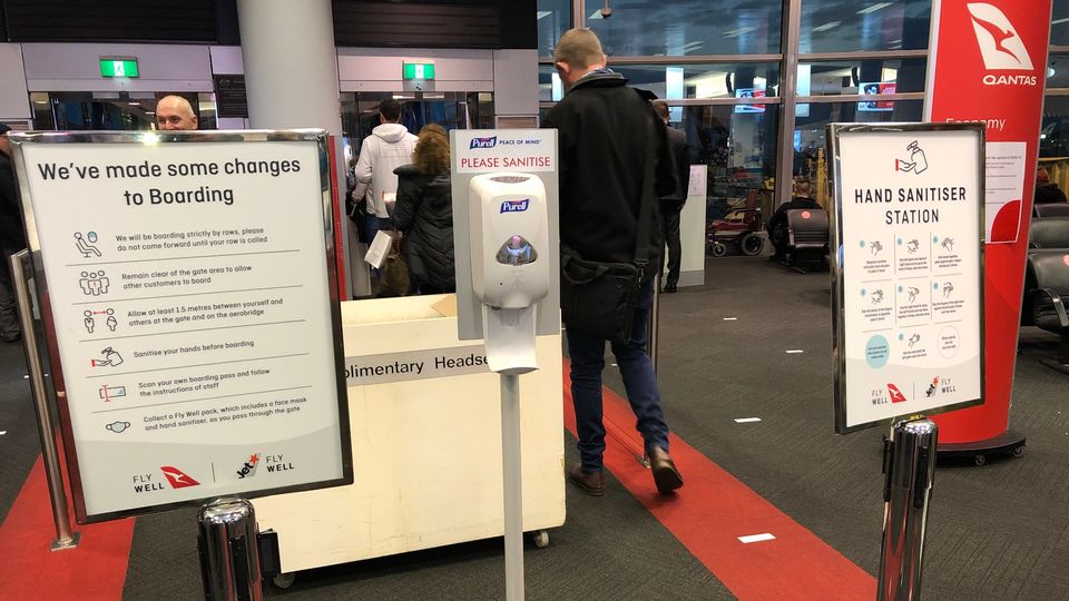 Boarding our Qantas flight from Sydney to Melbourne.