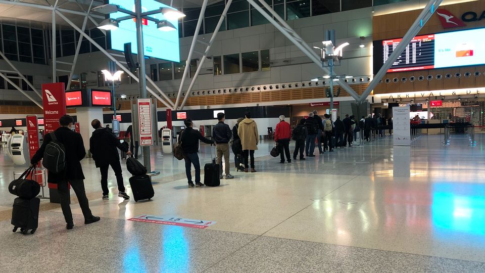 The snaking socially-distanced security line at Sydney Airport's Terminal 3.