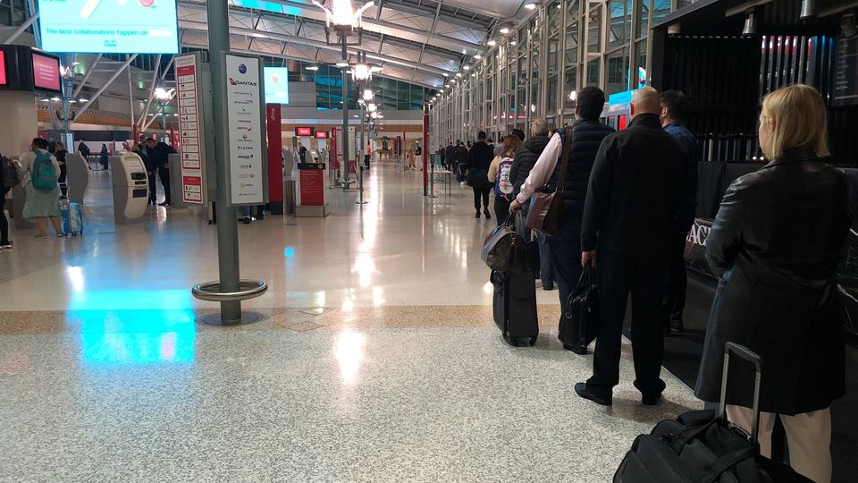 The tail end of the snaking socially-distanced security line at Sydney Airport's Terminal 3.