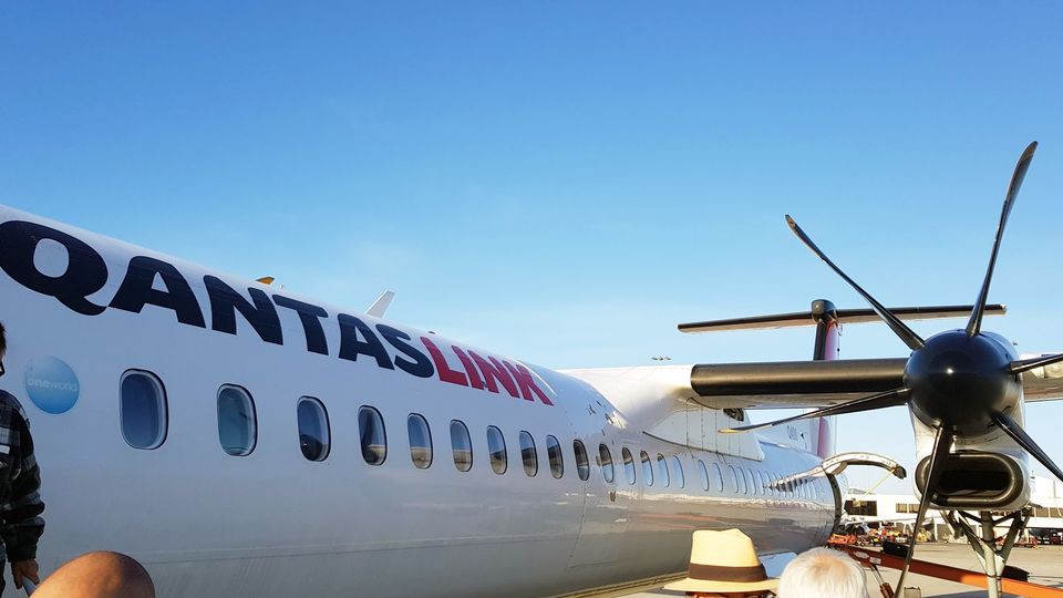 Before leaving a QantasLink flight, ensure you have collected any tagged 'premium hand luggage'.