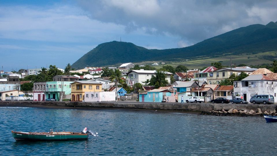 The unassuming island of St Kitts has become a second home, at least on paper, to many wealthy jet-setters.