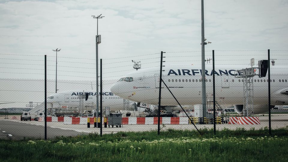 Grounded Air France passenger aircraft on the tarmac at Paris Orly airport.