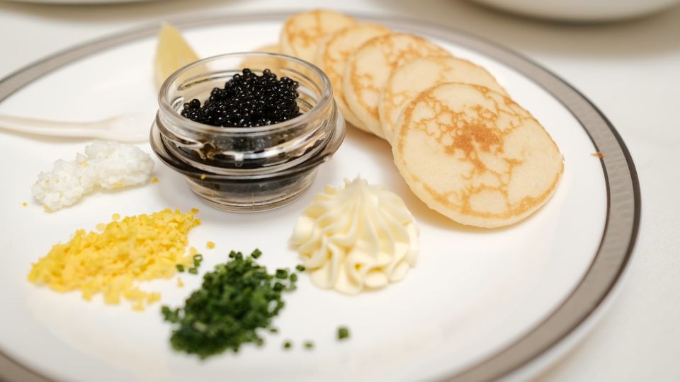 Each first class meal starts with a plate of Oscietra caviar.
