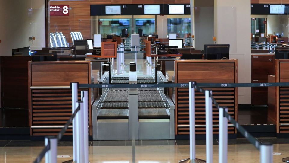 Check-in counters in Terminal One of Berlin Brandenburg Airport.