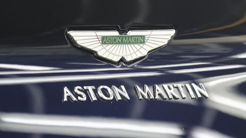 Aston Martin has seen multiple badges, from the round A and M intertwined in the 1920s to the winged monogram in the 1930s.