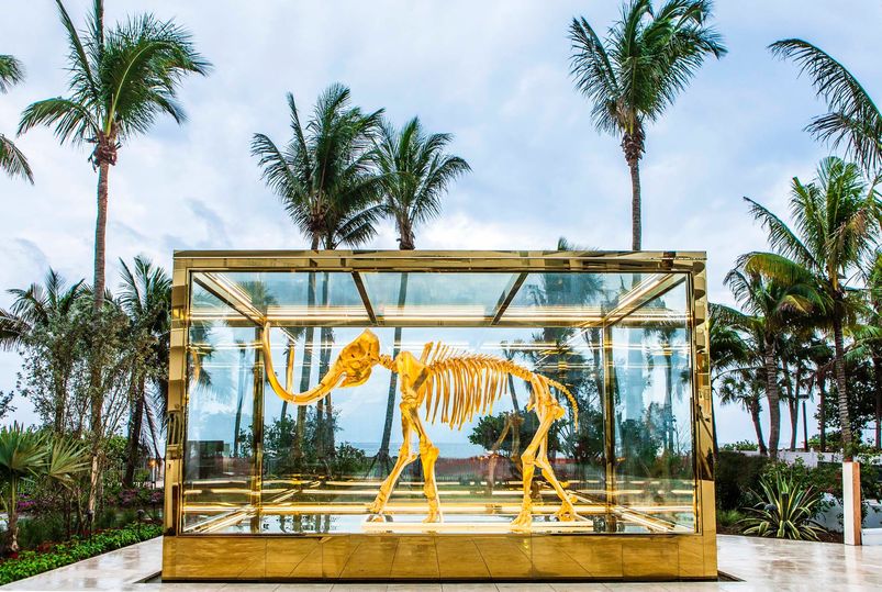 Damien Hirst's golden mammoth is on display at Faena Miami Beach.