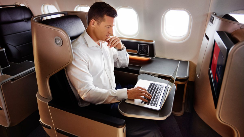 There's plenty of room to work (or binge some downloaded TV shows) in Qantas' A330 business class.