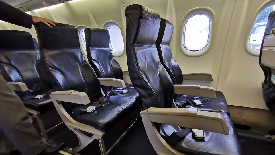 There's no middle seat on QantasLink's Dash 8s: everybody gets an aisle or a window.