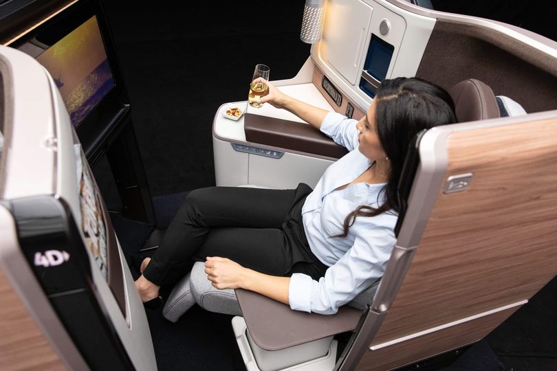 Qatar Airways' Boeing 787-9 business class suite adopts this design from Adient Aerospace.