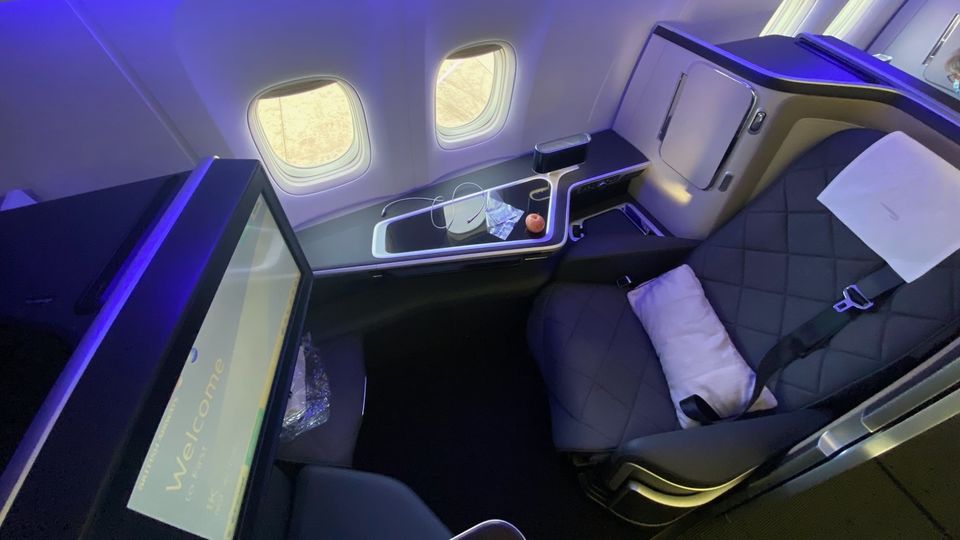 Room to stretch out, but that off-centre video screen could be a bother.. George Budd