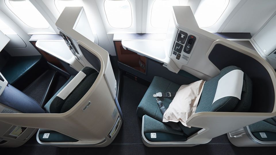 The angled window-facing seating layout in Cathay's long-range business class is popular with tall flyers.