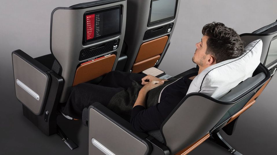 The compromised sleeping position of premium economy makes it less likely to see a 'downgrade' from business class.