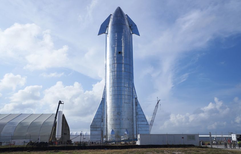 Ready for lift-off: the SapceX perches atop its Super Heavy booster rocket.