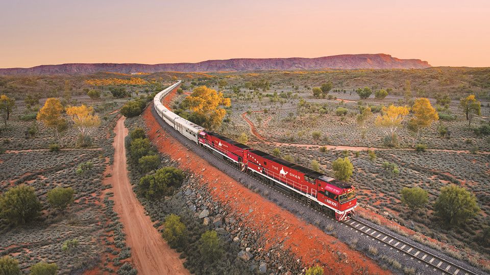 The Ghan with the MacDonnell Ranges in the distance