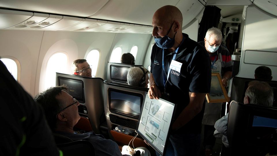 The onboard auction allows sightseers to bid on some special souvenirs.. Matt Abbott