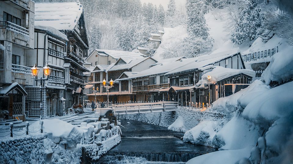 Snow-clad buildings in Ginzan Onsen, Tohoku. JNTO