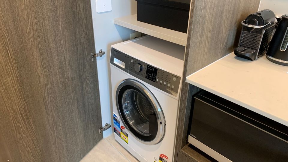The washer and dryer is a handy addition to each apartment.