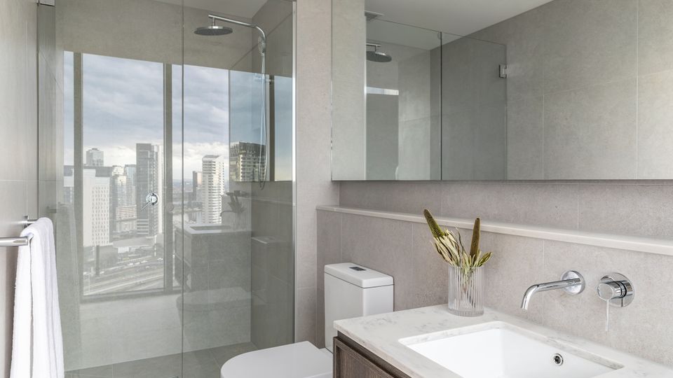 Bathrooms feature a walk-in shower but no bathtub.