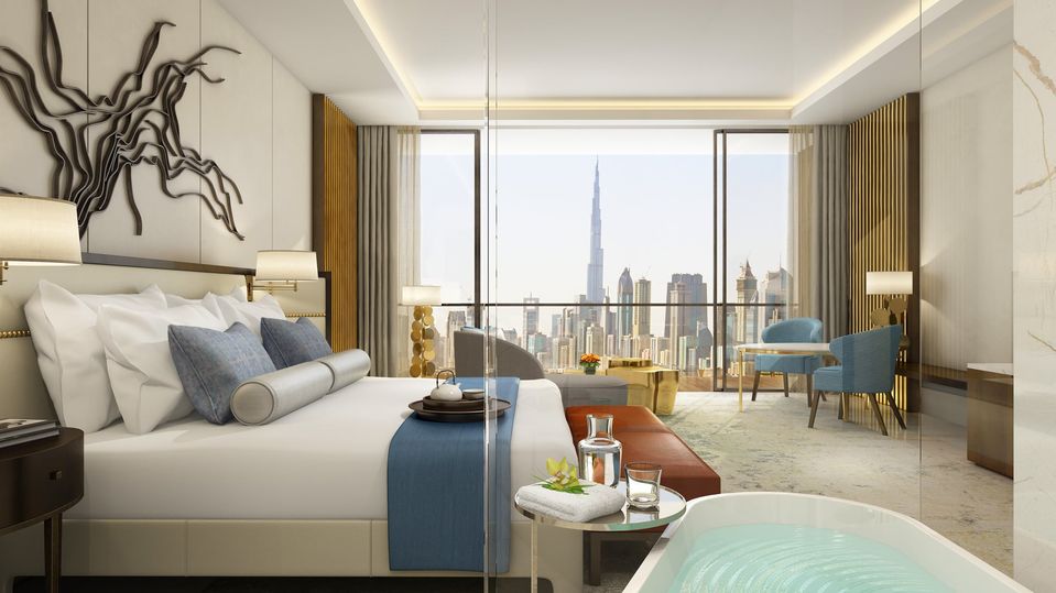 Rooms offer views of the Arabian Gulf or the city's iconic skyline, including the Burj Khalifa spire.